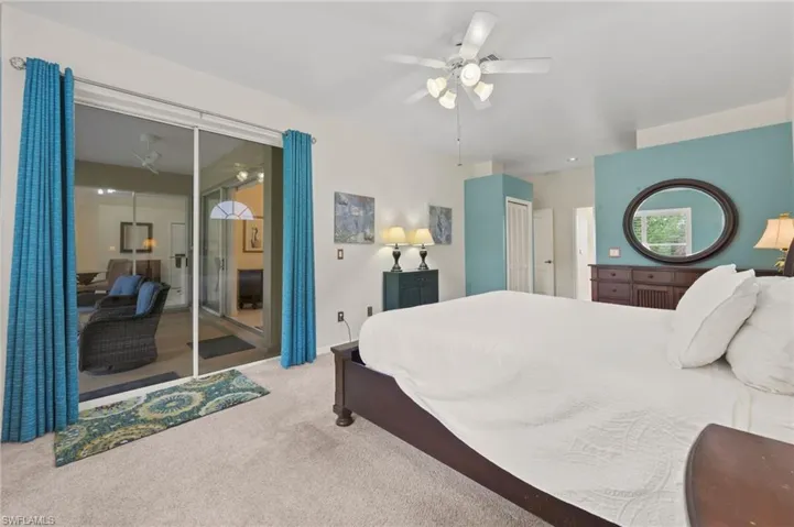 Primary Bedroom with Sliders to Lanai.
