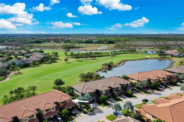 Aerial view featuring the condo and golf course