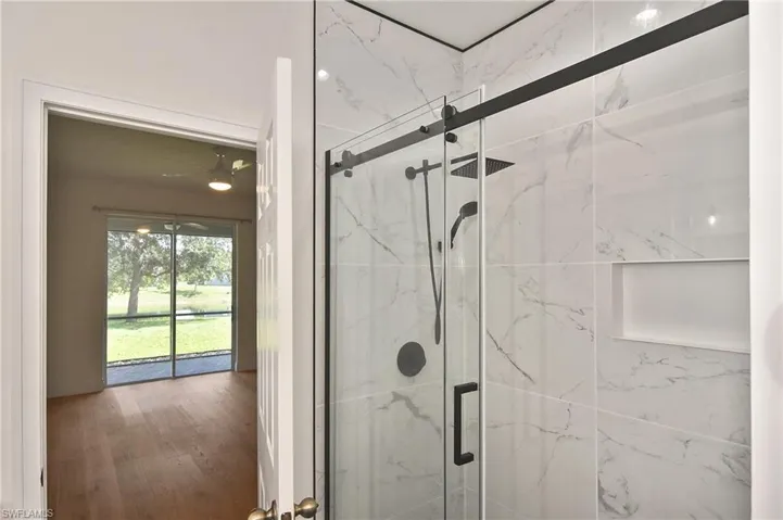Newly updated custom tiled ensuite shower with glass enclosure