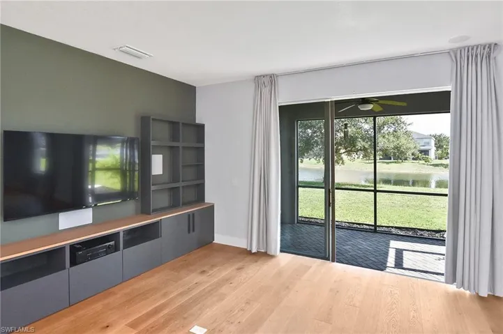 Great Room with glass sliders to your paver Lanai