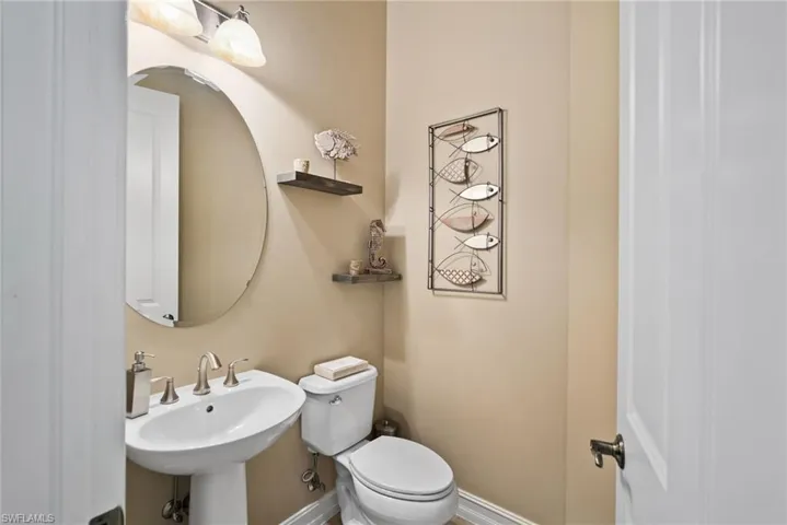 Bathroom with sink and toilet