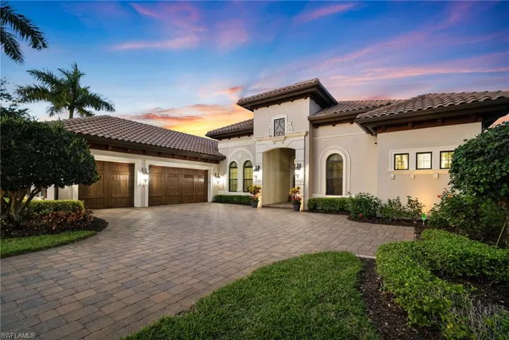 Contemporary style home with a garage