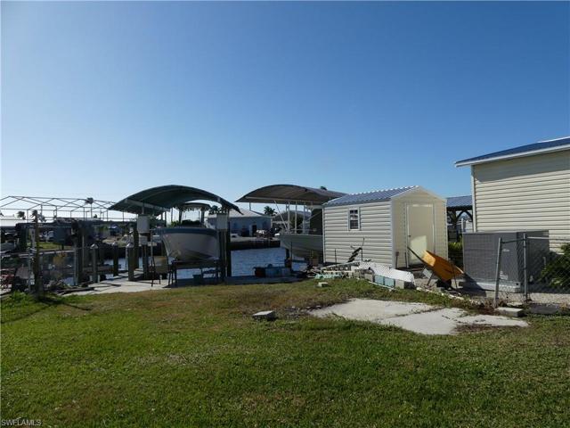Backyard and Covered Boat Lift