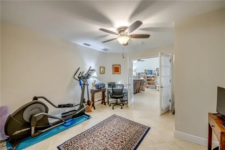 Home office featuring ceiling fan