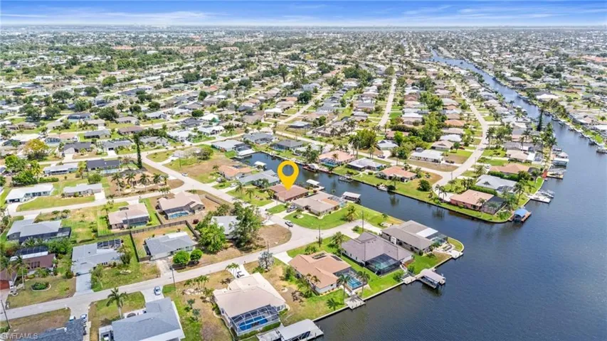 Aerial view of property and surrounding area  Photo virtually enhanced.