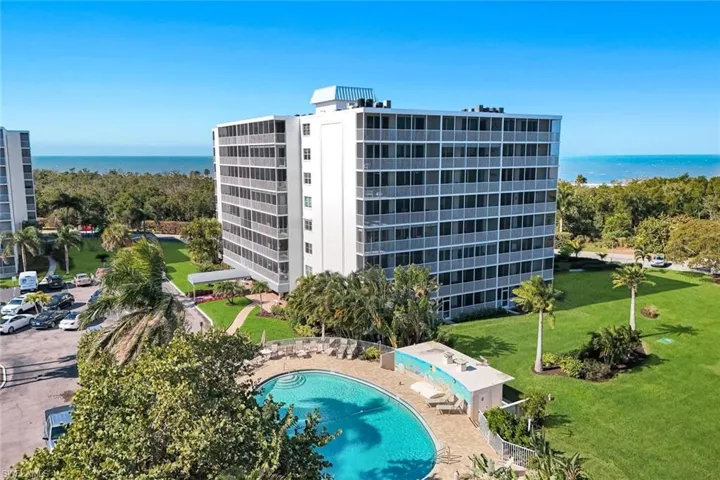 Aerial view of building showing pool