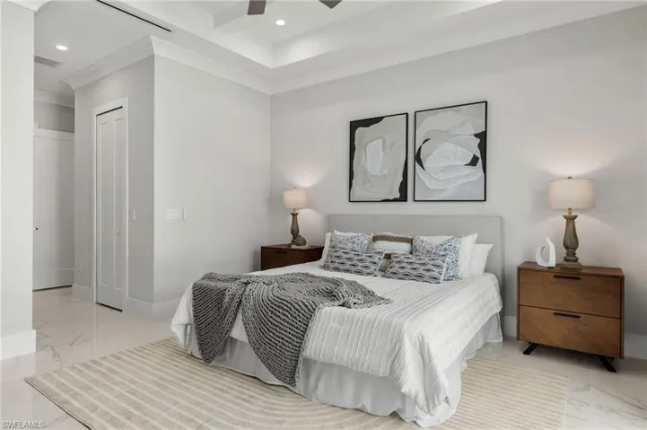 Bedroom with a closet, marble finish floor, baseboards, visible vents, and recessed lighting