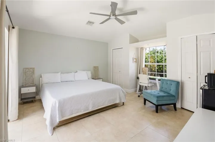 Mother in law suite just off of the courtyard pool has its own separate entrance bathroom. A great flex room that could even be used as an office!