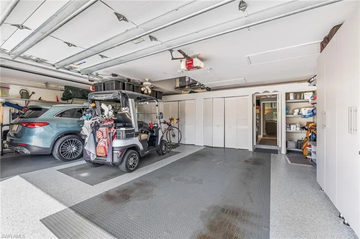 3 car garage with Epoxy flooring