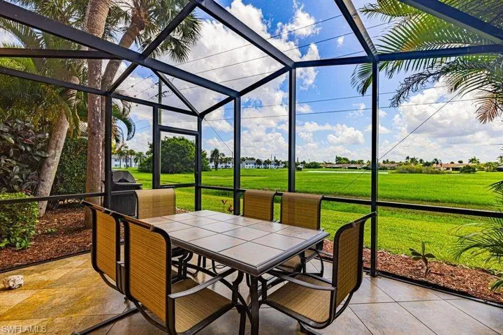 Screened in Lanai with outdoor dining area