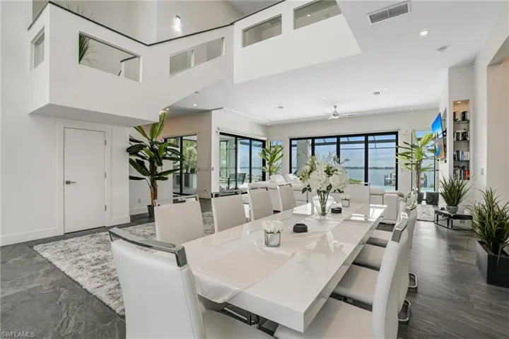 Dining space featuring ceiling fan and recessed lighting
