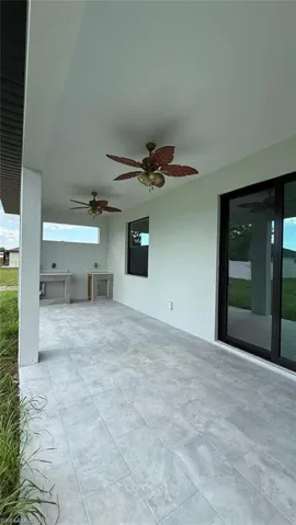 View of patio / terrace featuring ceiling fan and area for grilling