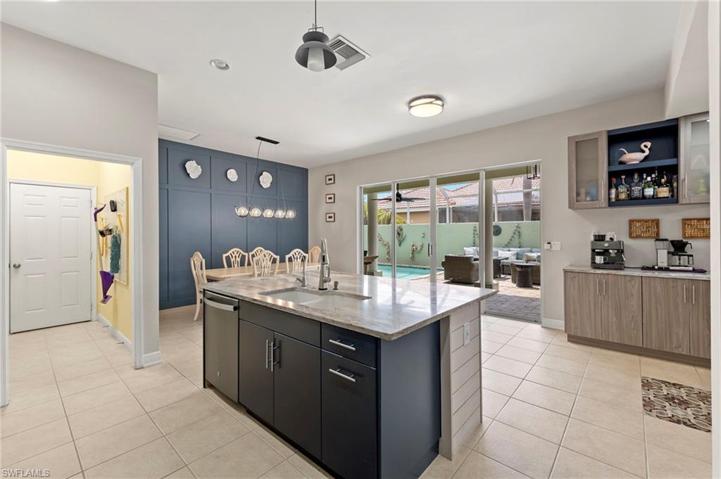 Coffee Bar as well! Casual Dining area fits a large table.  Or could be converted to a family Den area.