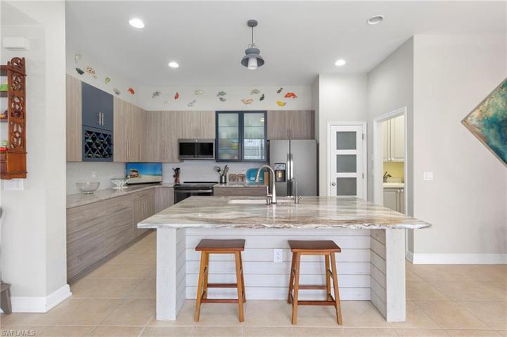Counter height bar for convenience.  So many cabinets!