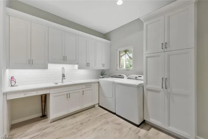 Laundry Room w. Extensive Storage incl. Foldaway Drip-Dry Rack & Ironing Board