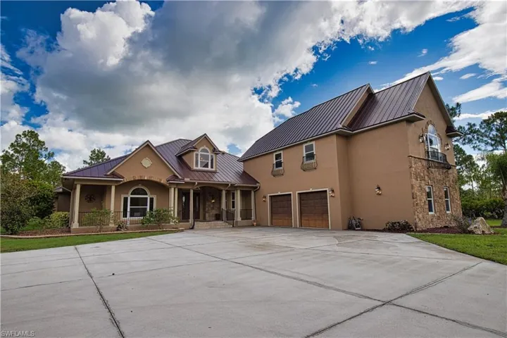 View of front of home with a garage
