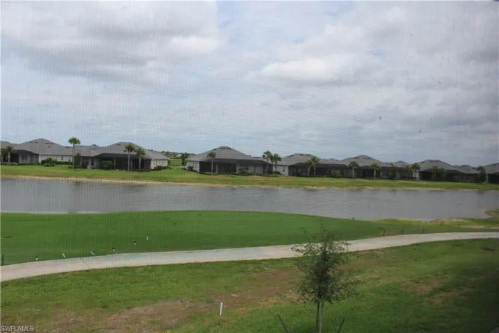 Water view featuring nearby suburban area
