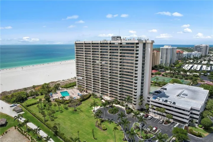 Birds eye view of property with a view of city and a water view