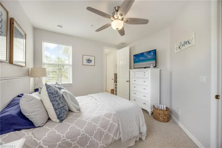 Bedroom featuring carpet flooring and a ceiling fan