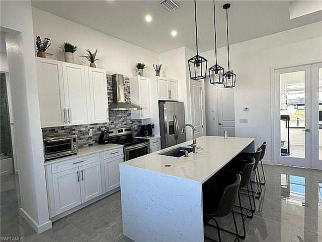 1629  Diplomat W PKWY, CAPE CORAL, FL 33993