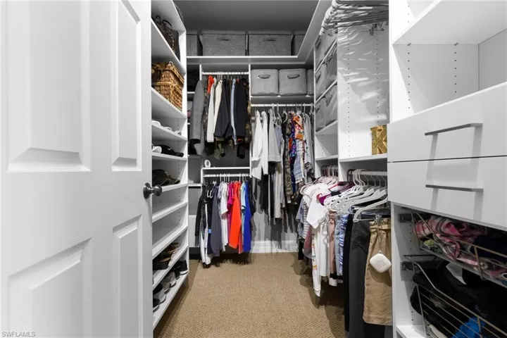 Separate his/hers walk-in California Closets