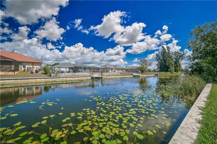 Water view with nearby suburban area