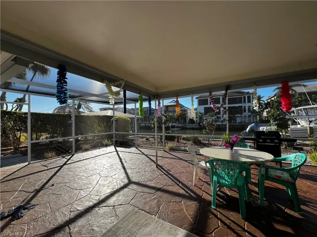 View of screened in patio with water views