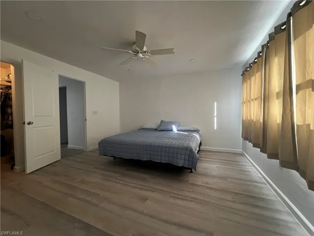 Master Bedroom featuring a spacious walk-in closet