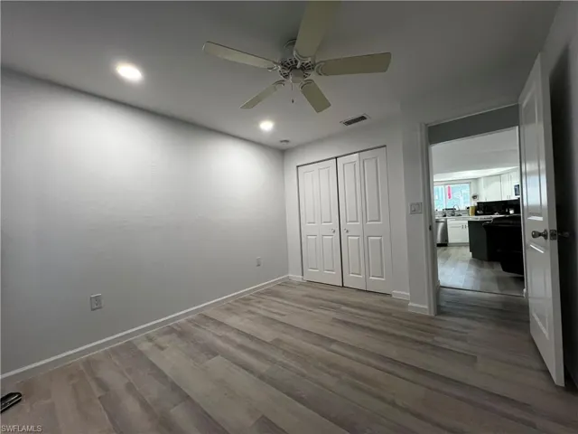 Unfurnished 2nd bedroom featuring a closet, and ceiling fan