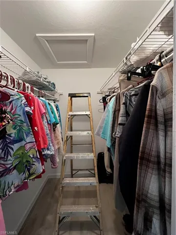 View of spacious walk-in closet