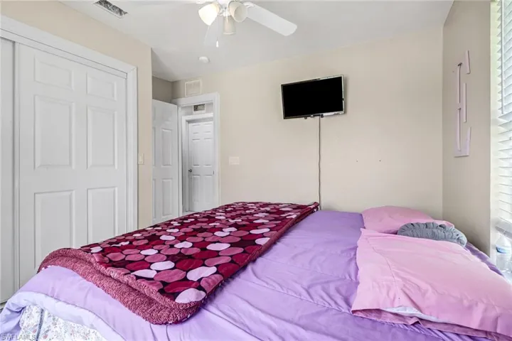 Bedroom featuring ceiling fan
