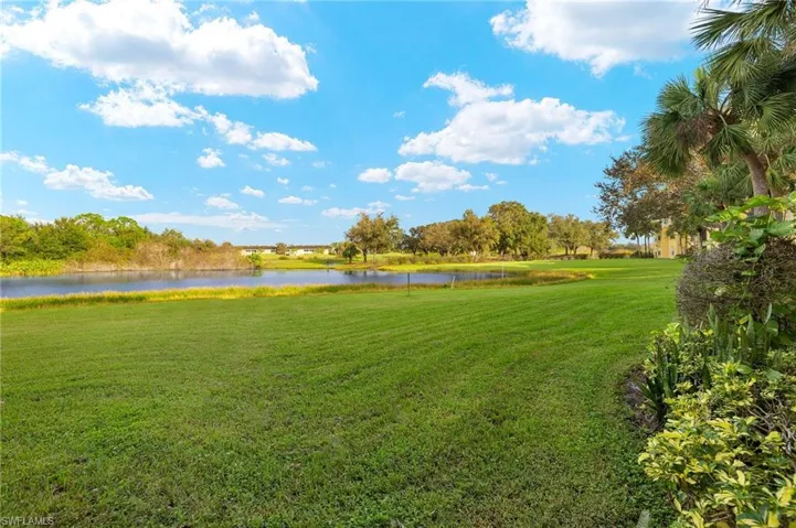 View of yard featuring a water view.