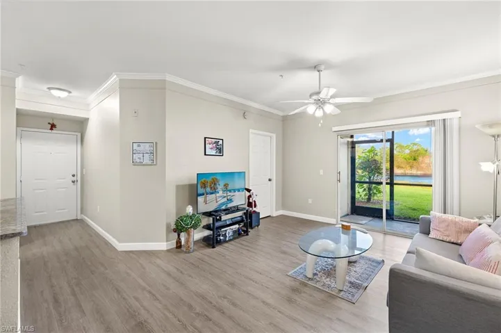 Living room with luxury vinyl flooring.