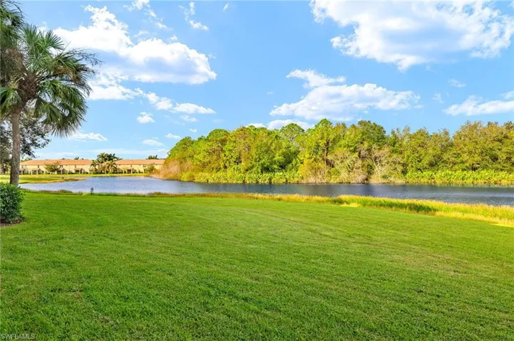 View of yard featuring a water view.