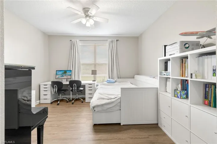 Primary bedroom with walk in closet.