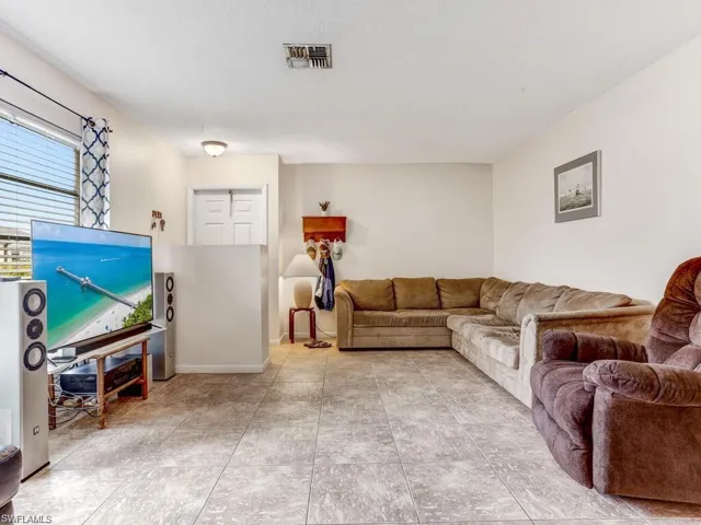 Living area featuring baseboards