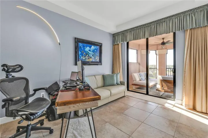 Home office with light tile patterned floors