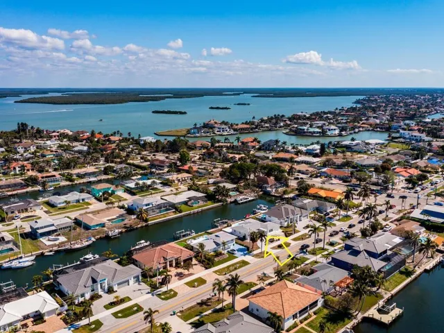 Aerial view with a water view and a residential view