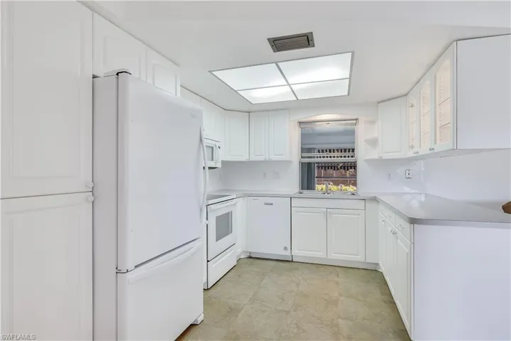 Extra cabinetry for additional storage ~ Lighted cabinets to display those "special" items.