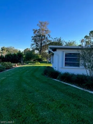 Back Yard~All Windows Have Storm Shutters