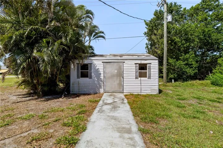View of outbuilding with an outdoor structure