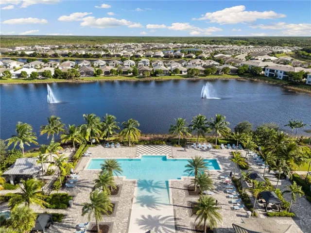 “Resort-style community”featuring a pool area and a large body of water