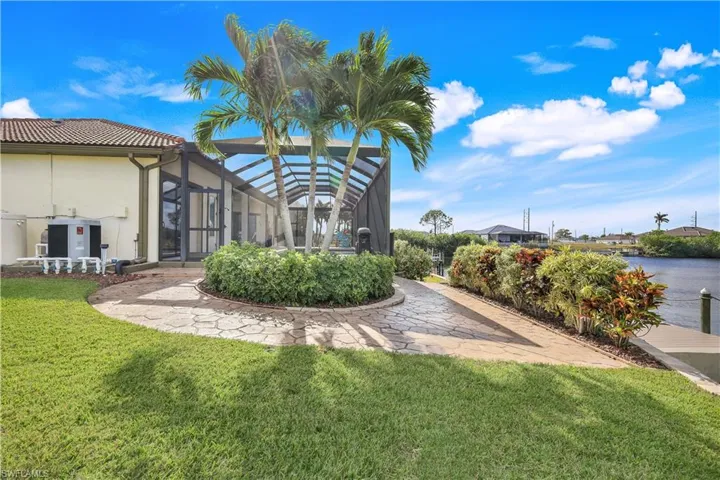 View of yard featuring a lanai
