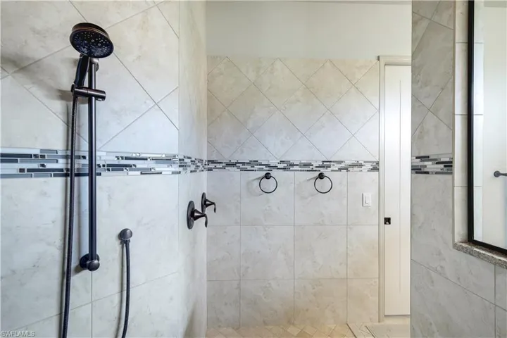 Bathroom with a tile shower