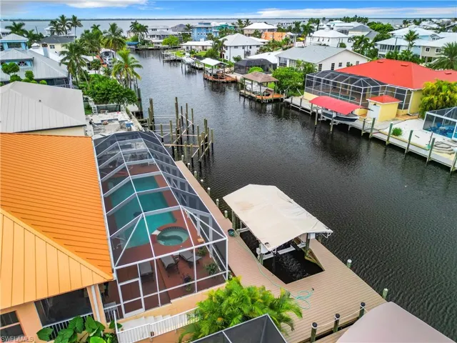 Aerial view of residential area with a nearby body of water