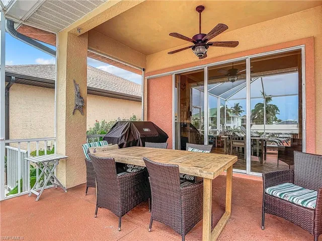 View of patio featuring ceiling fan and outdoor dining space