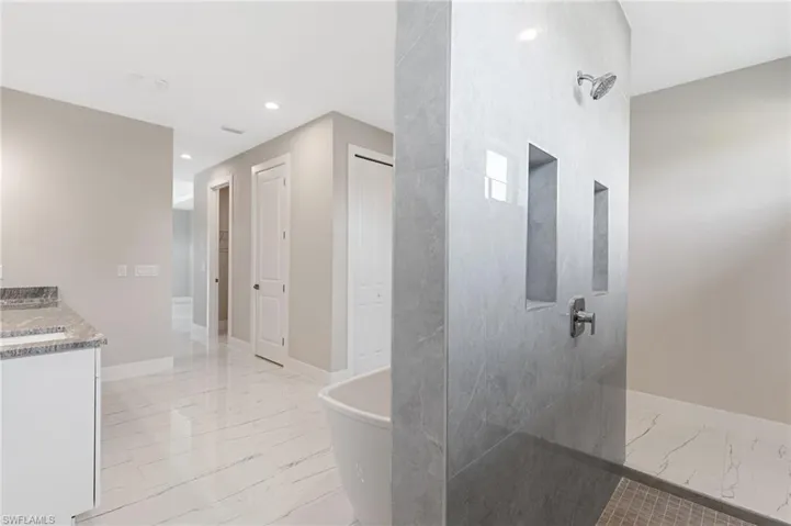 Bathroom with tile flooring and vanity