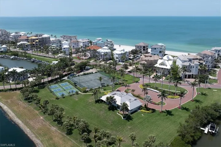 Drone / aerial view of community with a view of the Gulf of America.