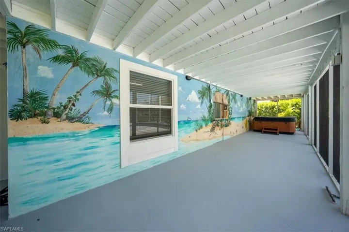 View of hand painted mural with a hot tub