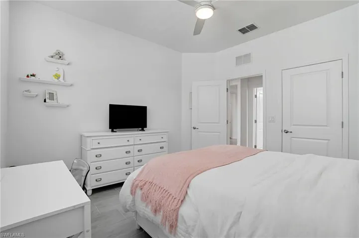 Bedroom featuring ceiling fan